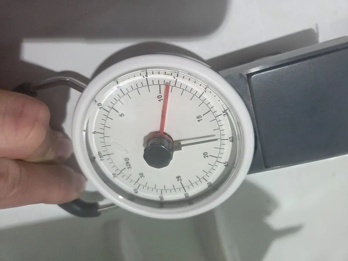 Close view of the hanging scale used for Fridge Bridge Support Bracket testing